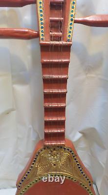 Hand made Four string bohemian art acoustic guitar / wall hanger / 27 in. Long