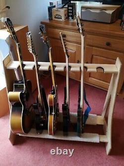 Hand made guitar rack to hold multiple guitars including acoustic and electric