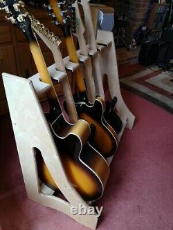 Hand made guitar rack to hold multiple guitars including acoustic and electric