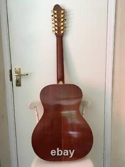 Left handed 12 string guitar. Hand made. Cuban mahogany back, sides and neck