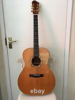 Left handed Hand made accoustic guitar. Cuban Mahogany back, sides and neck