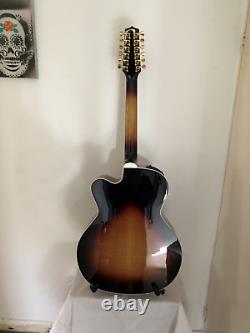 Takamine P-6 (hand made) Jumbo Cutaway 12 string guitar withcase. Newithnot used