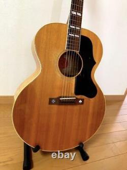 Guitare acoustique Gibson J-185 avec étui d'origine, fabriquée aux États-Unis dans les années 1990.
