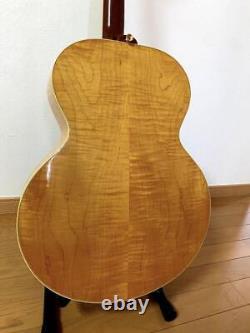 Guitare acoustique Gibson J-185 avec étui d'origine, fabriquée aux États-Unis dans les années 1990.