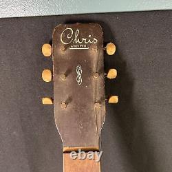 Guitare acoustique en bois naturel Chris Adjusto des années 1960 fabriquée aux États-Unis.