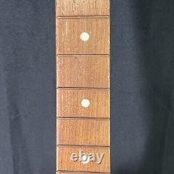 Guitare acoustique rouge en bois Harmony des années 1950 fabriquée aux États-Unis